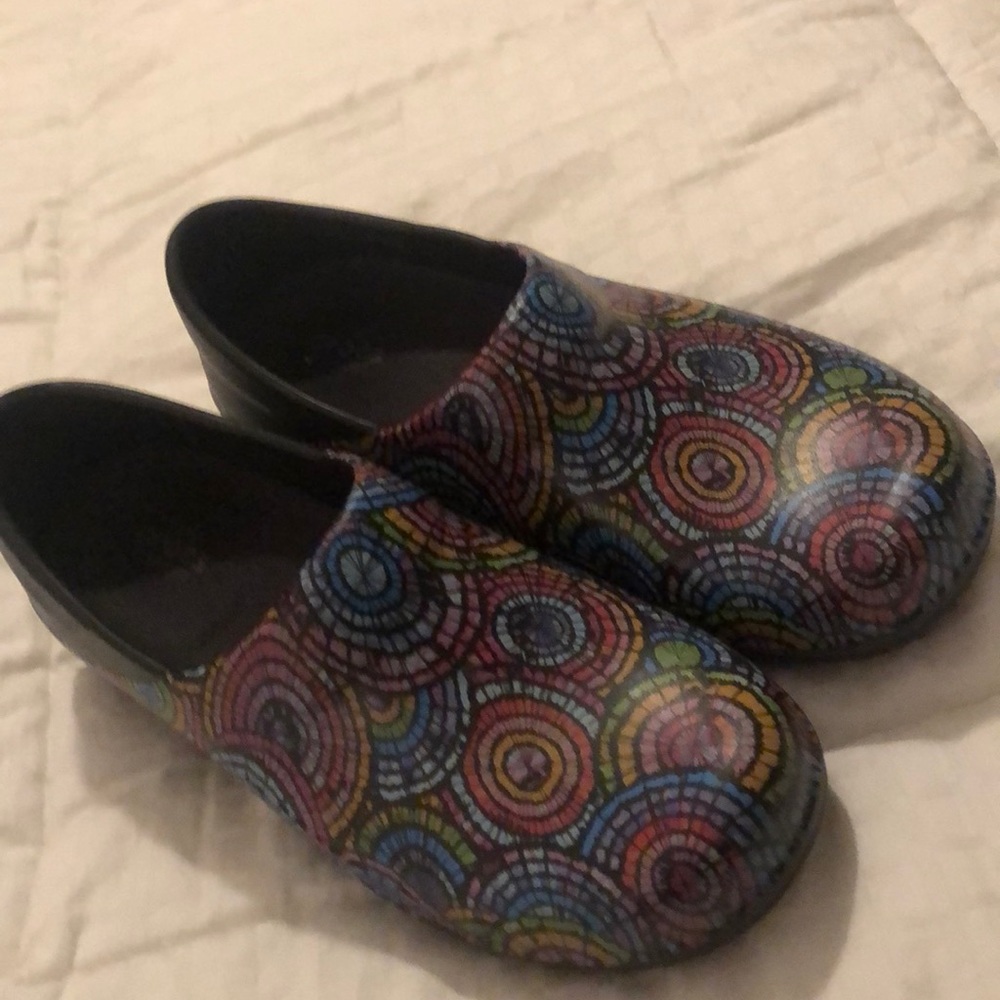 Multi colored Crocs clogs